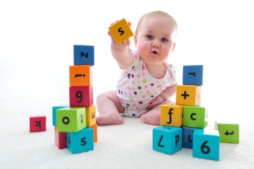 baby with learning bricks